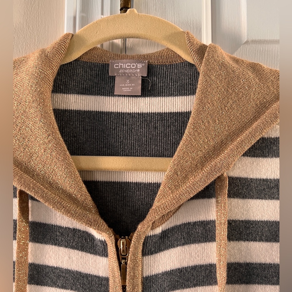 Gray and white long sleeve hoodie sweater with gold metallic accent. - Picture 4 of 4